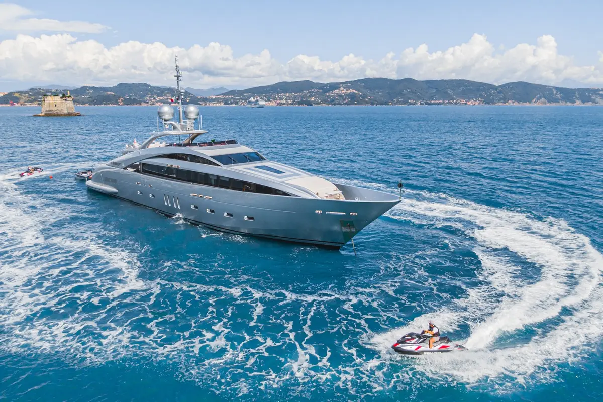 Silver Wind, exterior — Menorca Yacht Rental, Menorca. Stern beach club days, quiet sundeck evenings