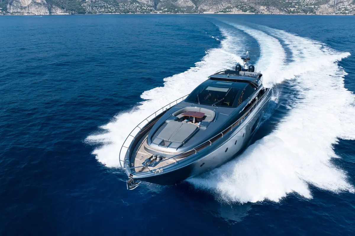 Riva 86 Domino, aft deck — Menorca Yacht Rental, Menorca. Classic Riva lines built for multi-day island routes