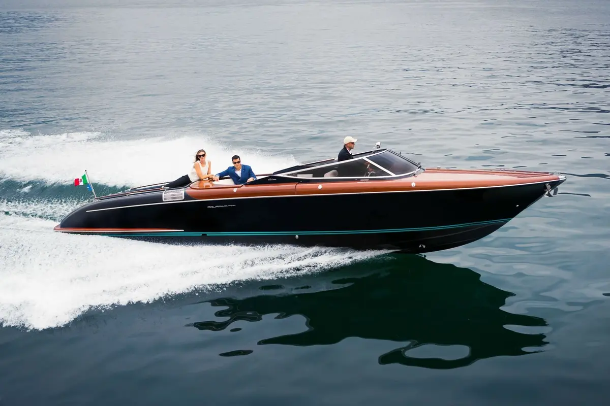 Riva Aquariva, exterior — Menorca Yacht Rental, Menorca. Mahogany-decked speed for a Menorca day out