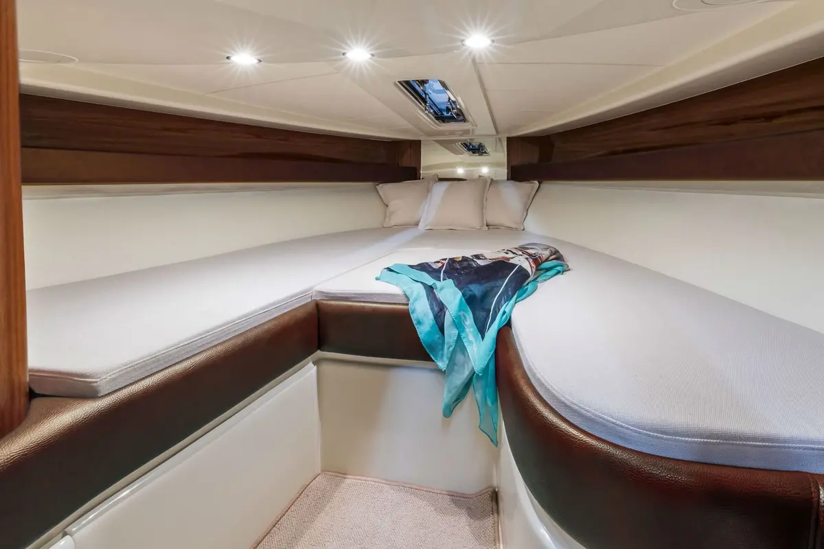 Riva Aquariva, aft deck — Menorca Yacht Rental, Menorca. Mahogany-decked speed for a Menorca day out